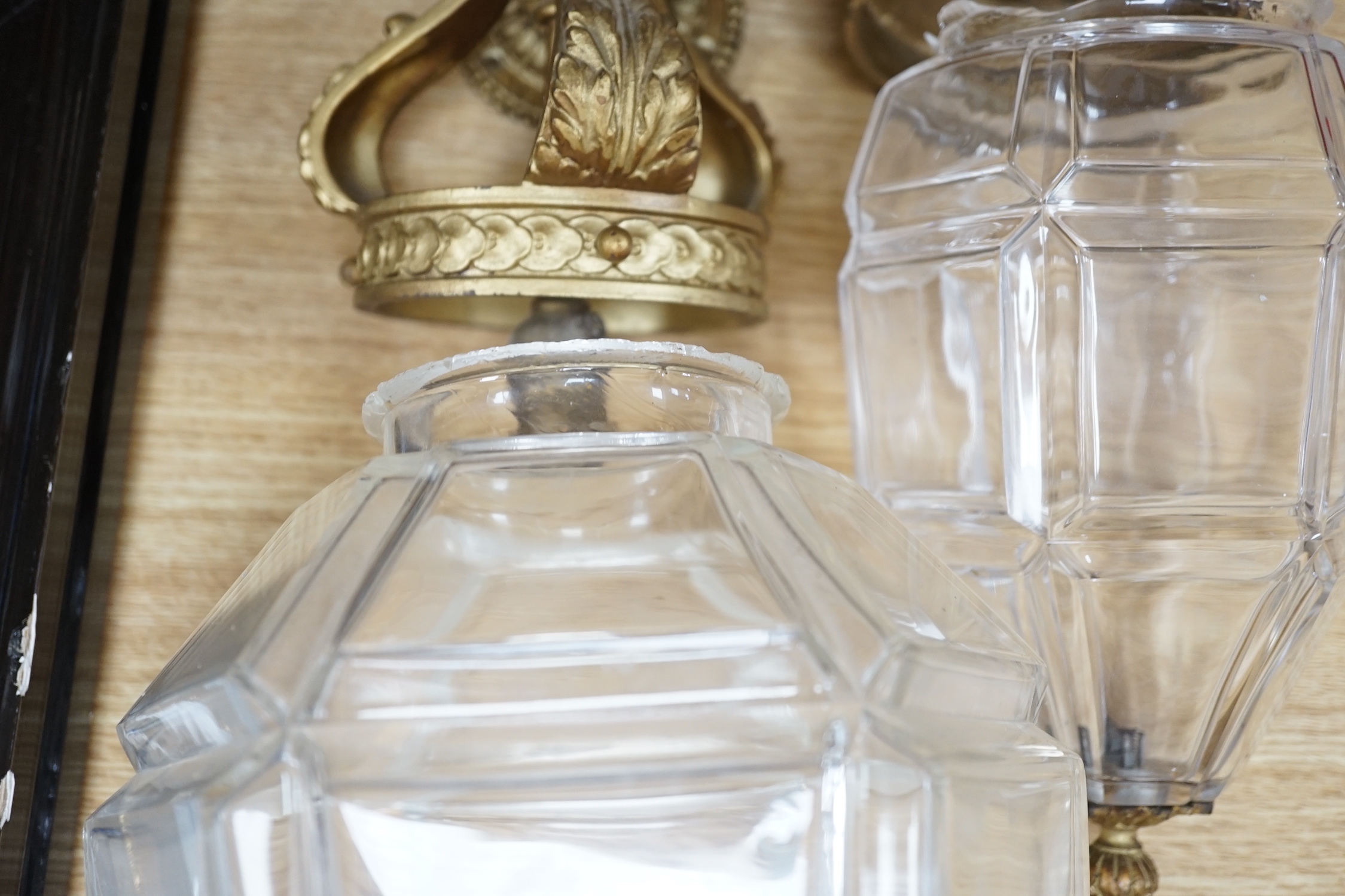 Two early 20th century gilt metal and art glass hall lanterns